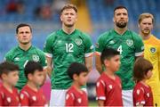 4 June 2022; Nathan Collins, 12, Republic of Ireland team-mates, from left, Josh Cullen, Shane Duffy and Caoimhin Kelleher stand for the playing of the National Anthem before the UEFA Nations League B group 1 match between Armenia and Republic of Ireland at Vazgen Sargsyan Republican Stadium in Yerevan, Armenia. Photo by Stephen McCarthy/Sportsfile