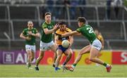 4 June 2022; Aaron Griffin of Clare is tackled by Daithí McGowan of Meath during the GAA Football All-Ireland Senior Championship Round 1 match between Clare and Meath at Cusack Park in Ennis, Clare. Photo by Seb Daly/Sportsfile