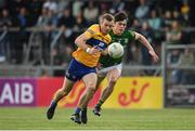 4 June 2022; Ciarán Russell of Clare in action against Eoin Harkin of Meath during the GAA Football All-Ireland Senior Championship Round 1 match between Clare and Meath at Cusack Park in Ennis, Clare. Photo by Seb Daly/Sportsfile