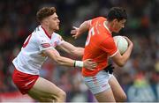 5 June 2022; Aaron McKay of Armagh in action against Conor Meyler of Tyrone during the GAA Football All-Ireland Senior Championship Round 1 match between Armagh and Tyrone at Athletic Grounds in Armagh. Photo by Ramsey Cardy/Sportsfile