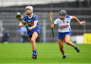 5 June 2022; Nicole Walsh of Tipperary is tackled by Keeley Corbett Barry of Waterford during the Glen Dimplex Senior Camogie Championship match between Tipperary and Waterford at Semple Stadium in Thurles, Tipperary. Photo by Ray McManus/Sportsfile