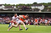 5 June 2022; Aidan Nugent of Armagh in action against Peter Teague of Tyrone during the GAA Football All-Ireland Senior Championship Round 1 match between Armagh and Tyrone at Athletic Grounds in Armagh. Photo by Ben McShane/Sportsfile