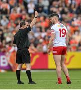 5 June 2022; Richard Donnelly of Tyrone is shown a black card by referee David Coldrick during the GAA Football All-Ireland Senior Championship Round 1 match between Armagh and Tyrone at Athletic Grounds in Armagh. Photo by Ramsey Cardy/Sportsfile
