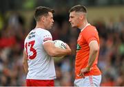5 June 2022; Darren McCurry of Tyrone and Greg McCabe of Armagh exchange words during the GAA Football All-Ireland Senior Championship Round 1 match between Armagh and Tyrone at Athletic Grounds in Armagh. Photo by Ramsey Cardy/Sportsfile