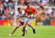5 June 2022; Rory Grugan of Armagh in action against Peter Harte of Tyrone during the GAA Football All-Ireland Senior Championship Round 1 match between Armagh and Tyrone at Athletic Grounds in Armagh. Photo by Ben McShane/Sportsfile