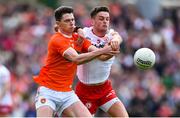 5 June 2022; Ben Crealey of Armagh in action against Michael McKernan of Tyrone during the GAA Football All-Ireland Senior Championship Round 1 match between Armagh and Tyrone at Athletic Grounds in Armagh. Photo by Ben McShane/Sportsfile