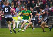 5 June 2022; Keith Beirne of Leitrim in action against Paul Kilcoyne of Sligo during the Tailteann Cup Quarter-Final match between Leitrim and Sligo at Avant Money Páirc Seán Mac Diarmada, Carrick-on-Shannon in Leitrim. Photo by Ray Ryan/Sportsfile