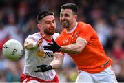 5 June 2022; Aidan Forker of Armagh in action against Pádraig Hampsey of Tyrone during the GAA Football All-Ireland Senior Championship Round 1 match between Armagh and Tyrone at Athletic Grounds in Armagh. Photo by Ben McShane/Sportsfile