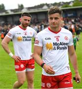 5 June 2022; Tyrone players Michael McKernan, right, and Pádraig Hampsey of Tyrone after their defeat in the GAA Football All-Ireland Senior Championship Round 1 match between Armagh and Tyrone at Athletic Grounds in Armagh. Photo by Ramsey Cardy/Sportsfile