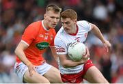 5 June 2022; Peter Harte of Tyrone in action against Rian O'Neill of Armagh during the GAA Football All-Ireland Senior Championship Round 1 match between Armagh and Tyrone at Athletic Grounds in Armagh. Photo by Ramsey Cardy/Sportsfile