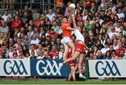 5 June 2022; Connaire Mackin of Armagh in action against Conn Kilpatrick of Tyrone during the GAA Football All-Ireland Senior Championship Round 1 match between Armagh and Tyrone at Athletic Grounds in Armagh. Photo by Ramsey Cardy/Sportsfile