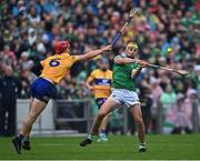 5 June 2022; Cathal O'Neill of Limerick scores a point under pressure from John Conlon of Clare during the Munster GAA Hurling Senior Championship Final match between Limerick and Clare at FBD Semple Stadium in Thurles, Tipperary. Photo by Piaras Ó Mídheach/Sportsfile