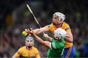 5 June 2022; Conor Cleary of Clare in action against Aaron Gillane of Limerick during the Munster GAA Hurling Senior Championship Final match between Limerick and Clare at Semple Stadium in Thurles, Tipperary. Photo by Ray McManus/Sportsfile