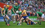 5 June 2022; Kyle Hayes of Limerick is tackled by Shane O'Donnell of Clare during the Munster GAA Hurling Senior Championship Final match between Limerick and Clare at FBD Semple Stadium in Thurles, Tipperary. Photo by Piaras Ó Mídheach/Sportsfile