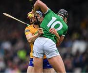 5 June 2022; Gearoid Hegarty of Limerick is tackled by David McInerney of Clare during the Munster GAA Hurling Senior Championship Final match between Limerick and Clare at Semple Stadium in Thurles, Tipperary. Photo by Ray McManus/Sportsfile