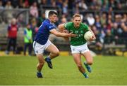 5 June 2022; Ultan Kelm of Fermanagh in action against James Smith of Cavan during the Tailteann Cup Quarter-Final match between Fermanagh and Cavan at Brewster Park in Enniskillen, Fermanagh. Photo by Philip Fitzpatrick/Sportsfile