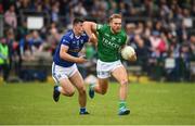5 June 2022; Ultan Kelm of Fermanagh in action against James Smith of Cavan during the Tailteann Cup Quarter-Final match between Fermanagh and Cavan at Brewster Park in Enniskillen, Fermanagh. Photo by Philip Fitzpatrick/Sportsfile
