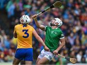 5 June 2022; Aaron Gillane of Limerick and Conor Cleary of Clare tussle during the Munster GAA Hurling Senior Championship Final match between Limerick and Clare at FBD Semple Stadium in Thurles, Tipperary. Photo by Piaras Ó Mídheach/Sportsfile