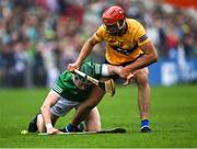 5 June 2022; William O'Donoghue of Limerick in action against Peter Duggan of Clare during the Munster GAA Hurling Senior Championship Final match between Limerick and Clare at FBD Semple Stadium in Thurles, Tipperary. Photo by Piaras Ó Mídheach/Sportsfile