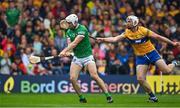 5 June 2022; Aaron Gillane of Limerick is hooked by Conor Cleary of Clare during the Munster GAA Hurling Senior Championship Final match between Limerick and Clare at FBD Semple Stadium in Thurles, Tipperary. Photo by Brendan Moran/Sportsfile