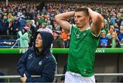 5 June 2022; Gearoid Hegarty of Limerick and performance psychologist Caroline Currid watch the closing moments of extra time in the Munster GAA Hurling Senior Championship Final match between Limerick and Clare at FBD Semple Stadium in Thurles, Tipperary. Photo by Brendan Moran/Sportsfile