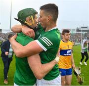 5 June 2022; Limerick players Gearoid Hegarty, centre, and William O'Donoghue celebrate as Tony Kelly of Clare leaves the pitch after the Munster GAA Hurling Senior Championship Final match between Limerick and Clare at FBD Semple Stadium in Thurles, Tipperary. Photo by Brendan Moran/Sportsfile