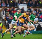 5 June 2022; Cathal Malone of Clare is dispossessed by Conor Boylan of Limerick during the Munster GAA Hurling Senior Championship Final match between Limerick and Clare at FBD Semple Stadium in Thurles, Tipperary. Photo by Brendan Moran/Sportsfile