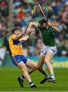 5 June 2022; Diarmaid Byrnes of Limerick pushes off Tony Kelly of Clare during the Munster GAA Hurling Senior Championship Final match between Limerick and Clare at FBD Semple Stadium in Thurles, Tipperary. Photo by Brendan Moran/Sportsfile