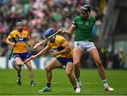 5 June 2022; Shane O'Donnell of Clare in action against Gearoid Hegarty of Limerick during the Munster GAA Hurling Senior Championship Final match between Limerick and Clare at FBD Semple Stadium in Thurles, Tipperary. Photo by Brendan Moran/Sportsfile