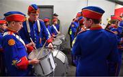 5 June 2022; The Artane Band members Matthew Newell, left, and Thomas Kilbane get ready in the tunnel in advance of performing Amhrán na bhFiann before the Munster GAA Hurling Senior Championship Final match between Limerick and Clare at FBD Semple Stadium in Thurles, Tipperary. Photo by Brendan Moran/Sportsfile
