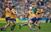 5 June 2022; Dan Morrisey of Limerick in action against Clare players, from left, Peter Duggan, Ian Galvin, Ryan Taylor and Cathal Malone during the Munster GAA Hurling Senior Championship Final match between Limerick and Clare at FBD Semple Stadium in Thurles, Tipperary. Photo by Piaras Ó Mídheach/Sportsfile