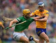 5 June 2022; Tom Morrisey of Limerick is tackled by Diarmuid Ryan of Clare during the Munster GAA Hurling Senior Championship Final match between Limerick and Clare at Semple Stadium in Thurles, Tipperary. Photo by Ray McManus/Sportsfile