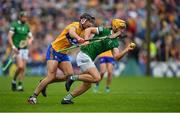 5 June 2022; Tom Morrisey of Limerick is tackled by Cathal Malone of Clare during the Munster GAA Hurling Senior Championship Final match between Limerick and Clare at Semple Stadium in Thurles, Tipperary. Photo by Ray McManus/Sportsfile