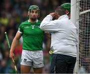 5 June 2022; Seán Finn of Limerick in conversation with an umpire during the Munster GAA Hurling Senior Championship Final match between Limerick and Clare at Semple Stadium in Thurles, Tipperary. Photo by Ray McManus/Sportsfile