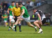 5 June 2022; Keith Beirne of Leitrim in action against Paul Kilcoyne of Sligo during the Tailteann Cup Quarter-Final match between Leitrim and Sligo at Avant Money Páirc Seán Mac Diarmada, Carrick-on-Shannon in Leitrim. Photo by Ray Ryan/Sportsfile