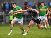 5 June 2022; Keith Beirne of Leitrim in action against Paul Kilcoyne of Sligo during the Tailteann Cup Quarter-Final match between Leitrim and Sligo at Avant Money Páirc Seán Mac Diarmada, Carrick-on-Shannon in Leitrim. Photo by Ray Ryan/Sportsfile