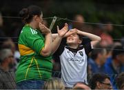 5 June 2022; Marie Dunne originally from Leitrim and now living in Sligo with her son James show their emotions at the closing stages of the match in the Tailteann Cup Quarter-Final match between Leitrim and Sligo at Avant Money Páirc Seán Mac Diarmada, Carrick-on-Shannon in Leitrim. Photo by Ray Ryan/Sportsfile