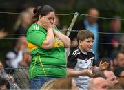 5 June 2022; Marie Dunne originally from Leitrim and now living in Sligo with her son James show their emotions at the closing stages of the match in the Tailteann Cup Quarter-Final match between Leitrim and Sligo at Avant Money Páirc Seán Mac Diarmada, Carrick-on-Shannon in Leitrim. Photo by Ray Ryan/Sportsfile