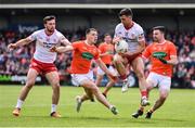 5 June 2022; Darren McCurry of Tyrone, supported by teammate Conor McKenna, left, in action against James Morgan, left, and Aidan Forker of Armagh during the GAA Football All-Ireland Senior Championship Round 1 match between Armagh and Tyrone at Athletic Grounds in Armagh. Photo by Ben McShane/Sportsfile