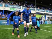 4 June 2022; Leinster captain James Ryan runs out with mascots Tony and Joanne McDonnell before the United Rugby Championship Quarter-Final match between Leinster and Glasgow Warriors at RDS Arena in Dublin. Photo by Harry Murphy/Sportsfile