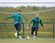 6 June 2022; Goalkeeper Caoimhin Kelleher faces a shot from Alan Browne during a Republic of Ireland training session at the FAI National Training Centre in Abbotstown, Dublin. Photo by Stephen McCarthy/Sportsfile