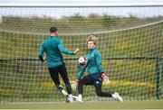 6 June 2022; Goalkeeper Caoimhin Kelleher faces a shot from Alan Browne during a Republic of Ireland training session at the FAI National Training Centre in Abbotstown, Dublin. Photo by Stephen McCarthy/Sportsfile