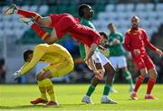 6 June 2022; Anto Babic of Montenegro collides with his own goalkeeper Nikola Ivezic during the UEFA European U21 Championship qualifying group F match between Republic of Ireland and Montenegro at Tallaght Stadium in Dublin. Photo by Seb Daly/Sportsfile