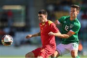 6 June 2022; Nikola Janjic of Montenegro in action against Conor Noss of Republic of Ireland during the UEFA European U21 Championship qualifying group F match between Republic of Ireland and Montenegro at Tallaght Stadium in Dublin. Photo by Seb Daly/Sportsfile