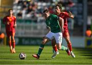 6 June 2022; Conor Coventry of Republic of Ireland in action against Miloš Brnovic of Montenegro during the UEFA European U21 Championship qualifying group F match between Republic of Ireland and Montenegro at Tallaght Stadium in Dublin. Photo by Eóin Noonan/Sportsfile