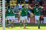 6 June 2022; Eiran Cashin of Republic of Ireland, 5, celebrates with teammate Mark McGuinness after assisting their side's second goal, scored by Liam Kerrigan, during the UEFA European U21 Championship qualifying group F match between Republic of Ireland and Montenegro at Tallaght Stadium in Dublin. Photo by Seb Daly/Sportsfile