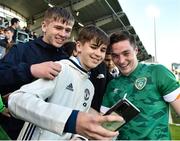 6 June 2022; Conor Coventry of Republic of Ireland with supporters after the UEFA European U21 Championship qualifying group F match between Republic of Ireland and Montenegro at Tallaght Stadium in Dublin. Photo by Eóin Noonan/Sportsfile