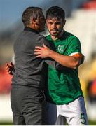 6 June 2022; Eiran Cashin of Republic of Ireland with Republic of Ireland manager Jim Crawford after the UEFA European U21 Championship qualifying group F match between Republic of Ireland and Montenegro at Tallaght Stadium in Dublin. Photo by Eóin Noonan/Sportsfile