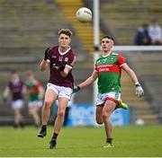 6 May 2022; Owen Morgan of Galway in action against Paul Gilmore of Mayo during the Electric Ireland Connacht GAA Football Minor Championship Final match between Galway and Mayo at Hastings Insurance MacHale Park in Castlebar, Mayo. Photo by Piaras Ó Mídheach/Sportsfile