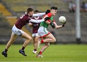 6 May 2022; Jack Keane of Mayo in action against Cillian Trayers of Galway during the Electric Ireland Connacht GAA Football Minor Championship Final match between Galway and Mayo at Hastings Insurance MacHale Park in Castlebar, Mayo. Photo by Piaras Ó Mídheach/Sportsfile